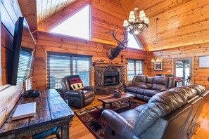 TV connectée, cheminée, jeux vidéo, lecteur de DVD