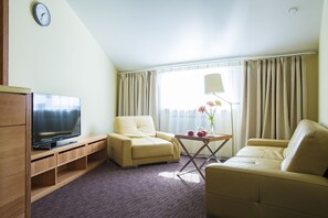 In-room safe, desk, laptop workspace, iron/ironing board - Grand Baikal Hotel (Baykalsk)