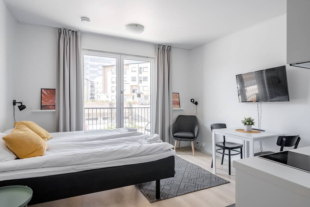 Standard Studio | Laptop workspace, blackout drapes, soundproofing, iron/ironing board