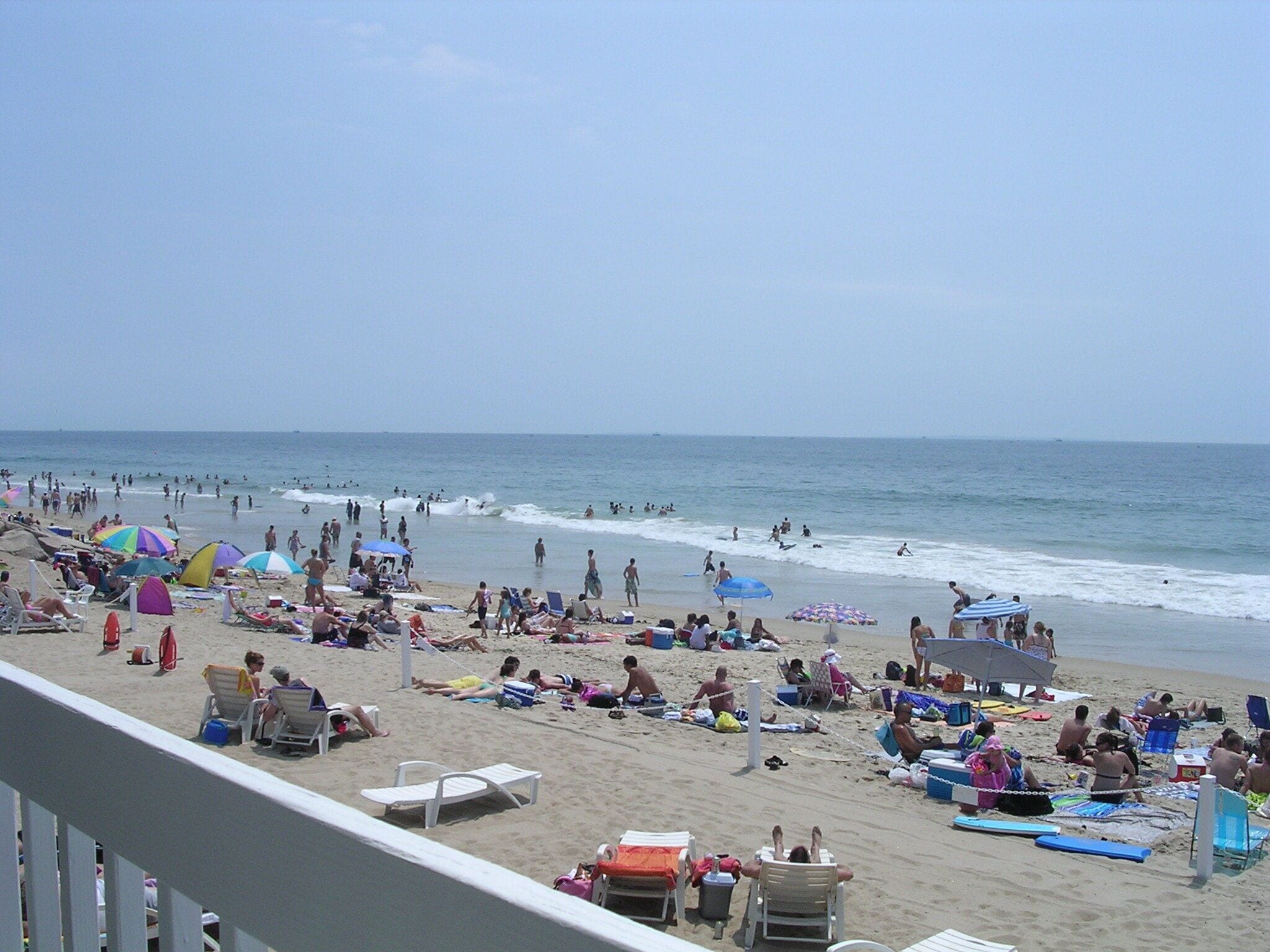 On the beach, sun-loungers