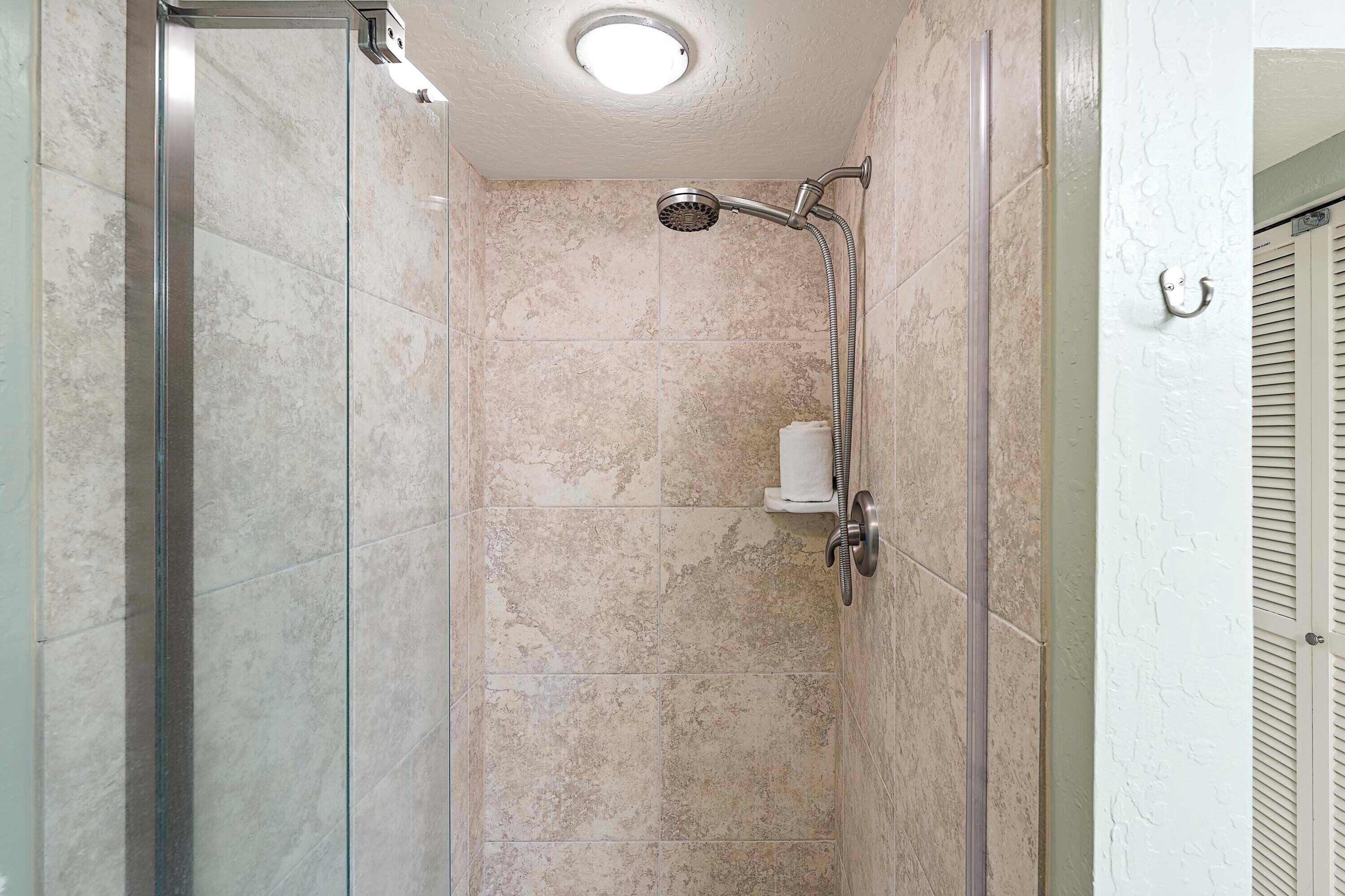 Shower, hair dryer, towels