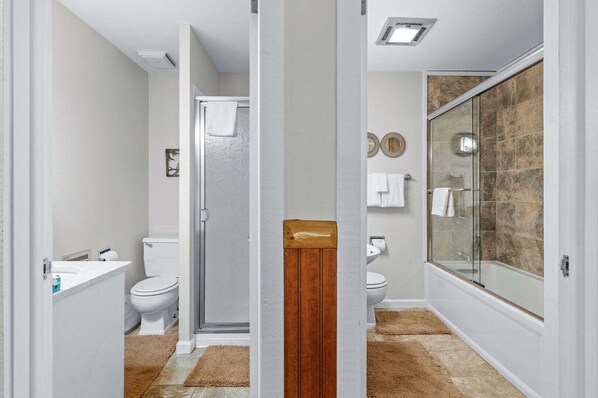 A bathroom with a shower, toilet, and sink. - RMR: Gros Ventre A5 Condo in Teton Village (Teton Village)