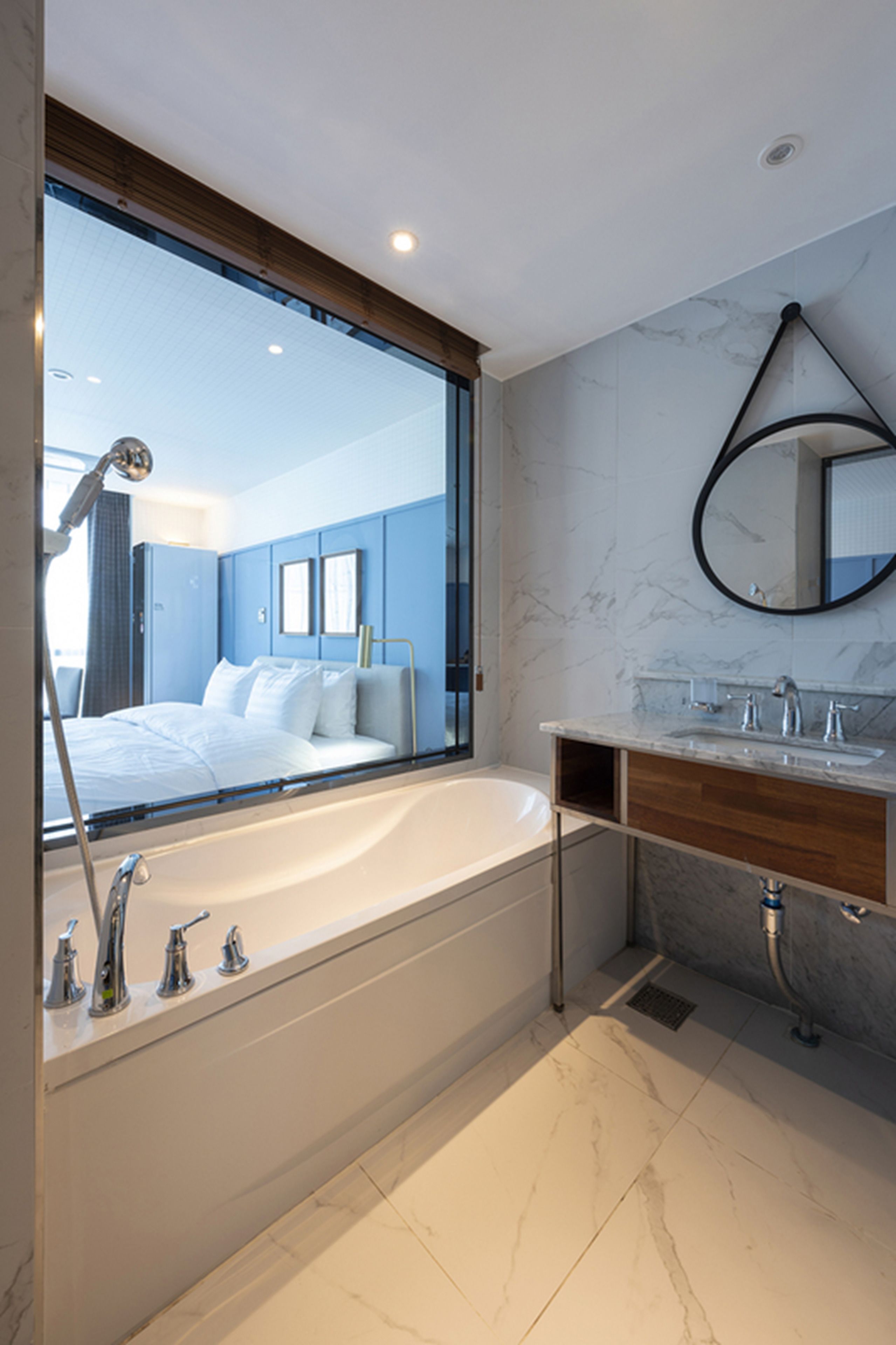 premium double room, 1 king bed, private bathroom | bathroom | combined shower/bathtub, free toiletries, hair dryer, bathrobes