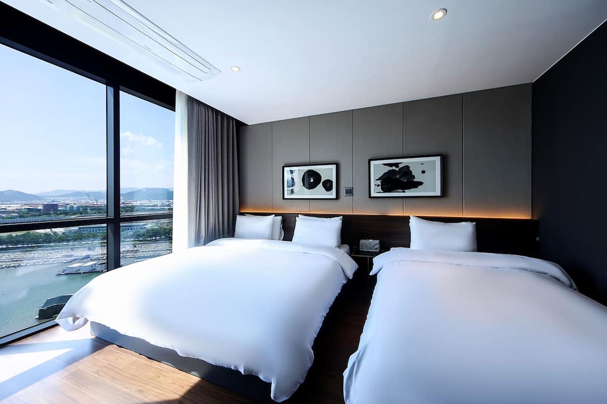 family twin room, 1 bedroom, private bathroom, beachfront | down duvets, soundproofing, free wifi, bed sheets