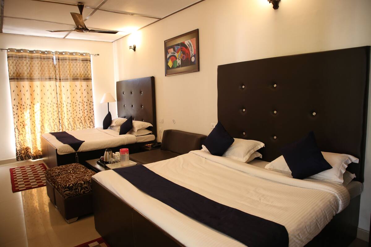 Family Quadruple Room, 1 Bedroom, Hill View | Desk, rollaway beds, free WiFi, bed sheets