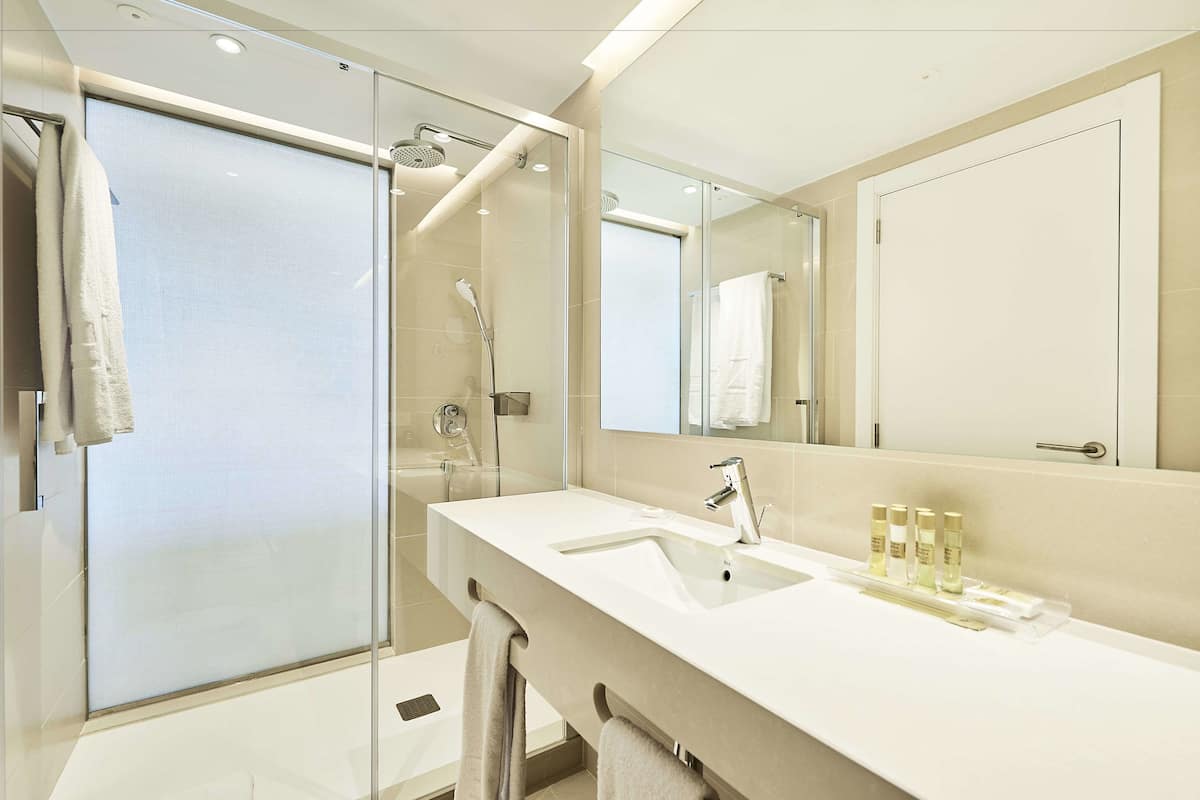 shower, eco-friendly toiletries, hair dryer, bathrobes