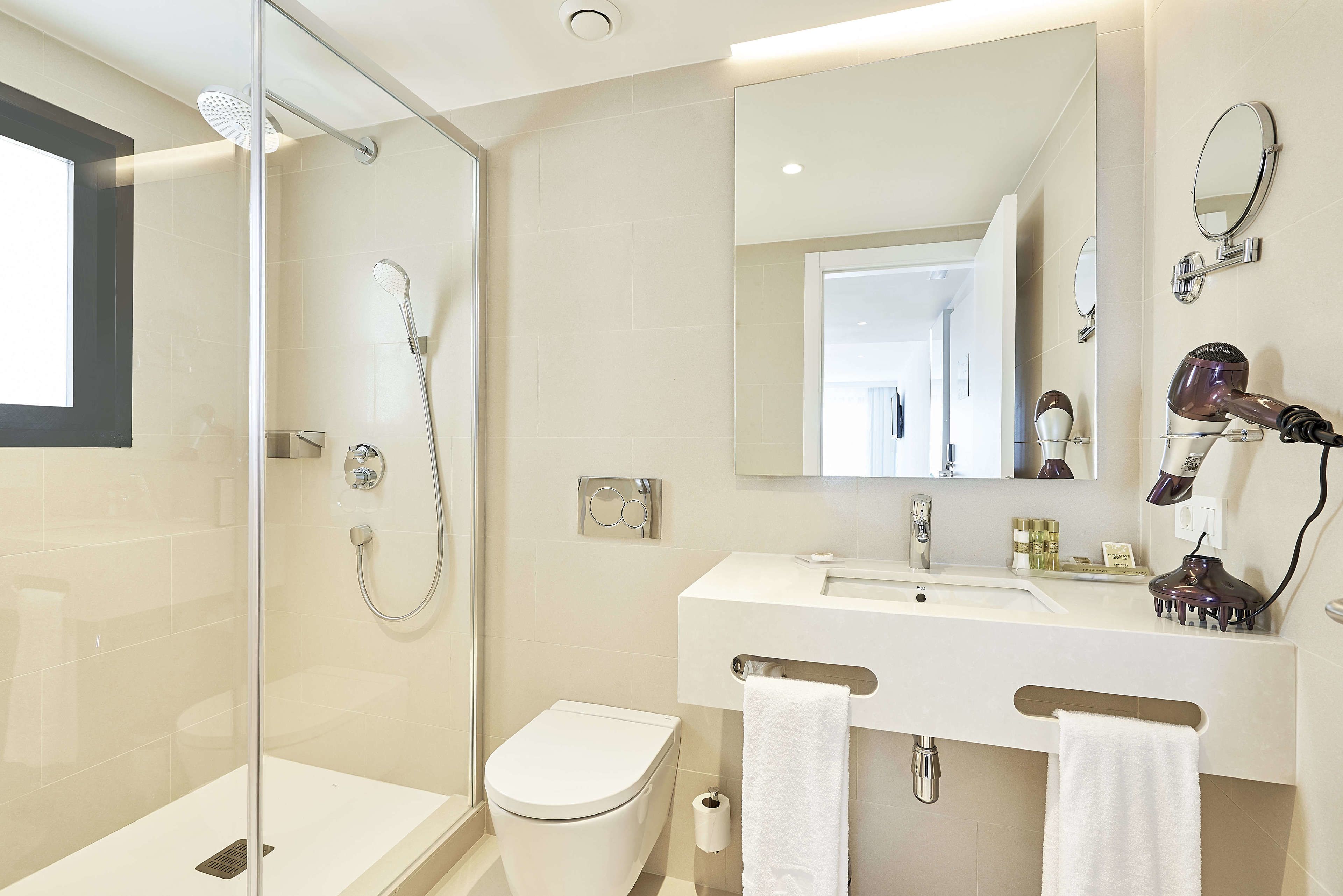 shower, eco-friendly toiletries, hair dryer, bathrobes