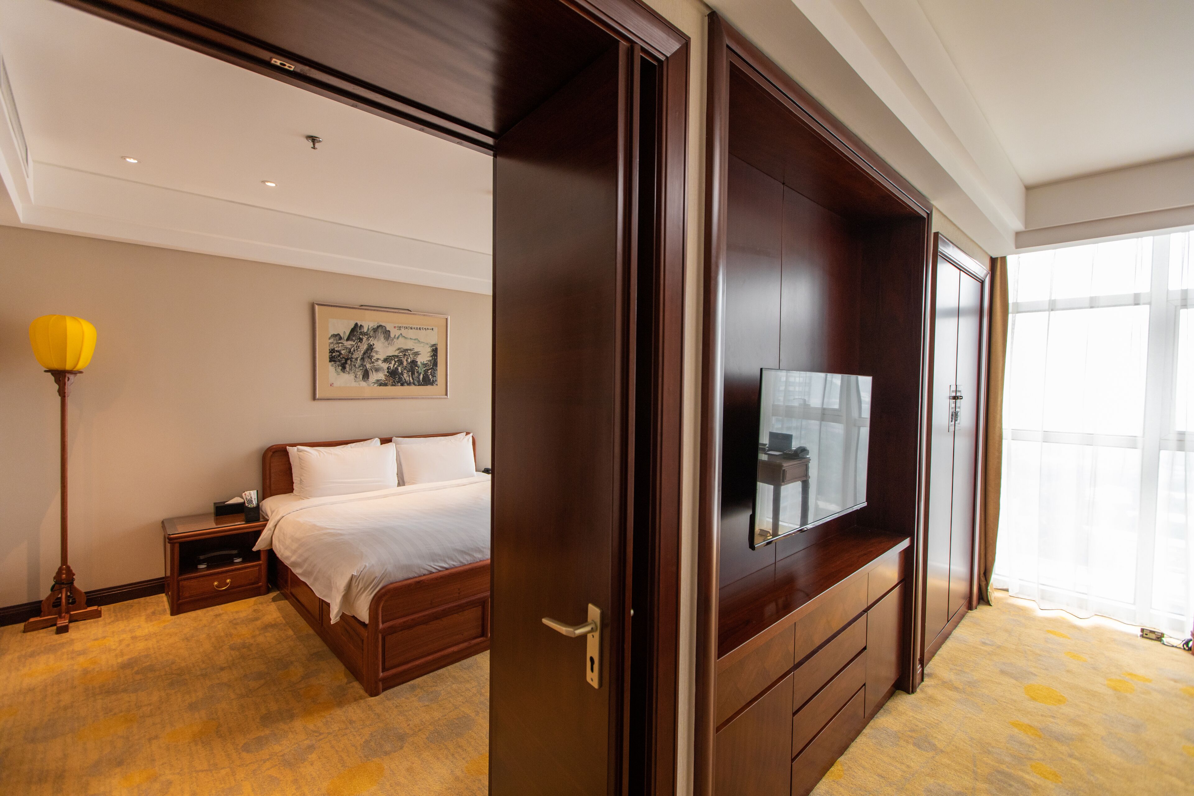 superior suite | minibar, in-room safe, desk, iron/ironing board