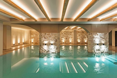 Indoor pool, outdoor pool, pool umbrellas, pool loungers. Cook's Club Hersonissos Crete