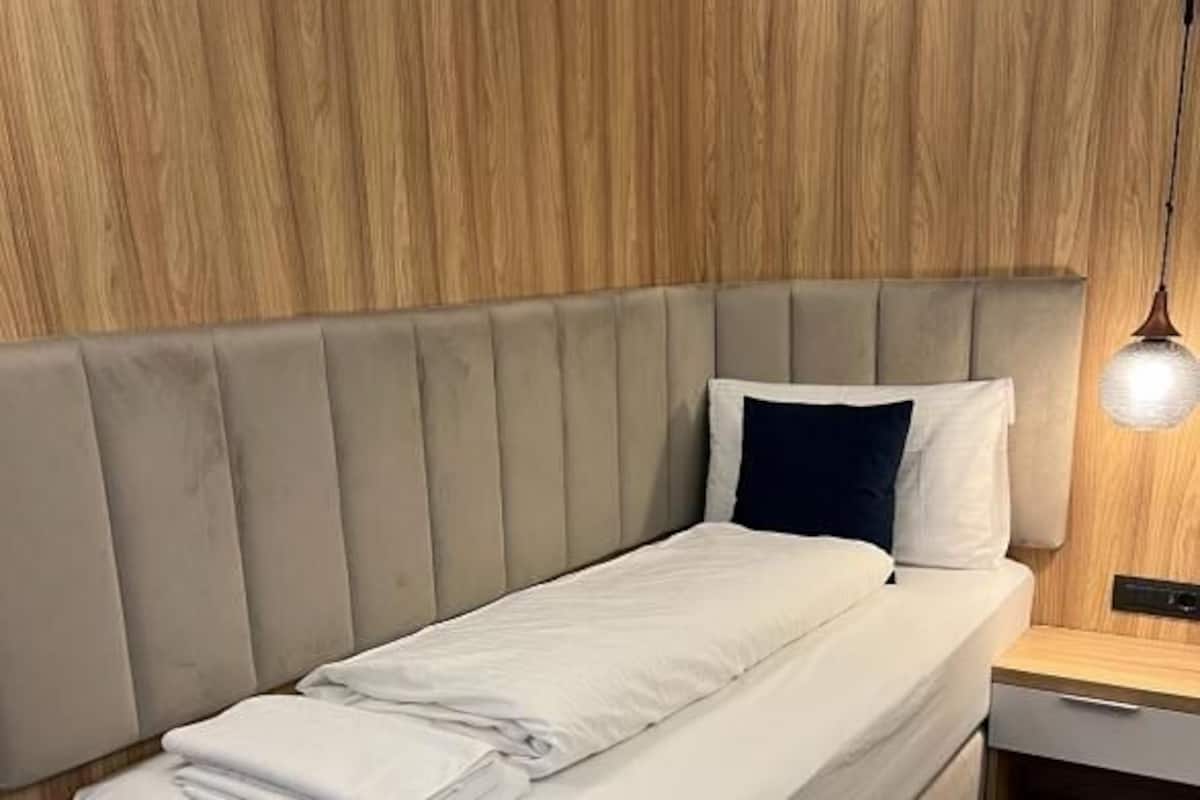 Standard Single Room | Premium bedding, desk, free WiFi, bed sheets