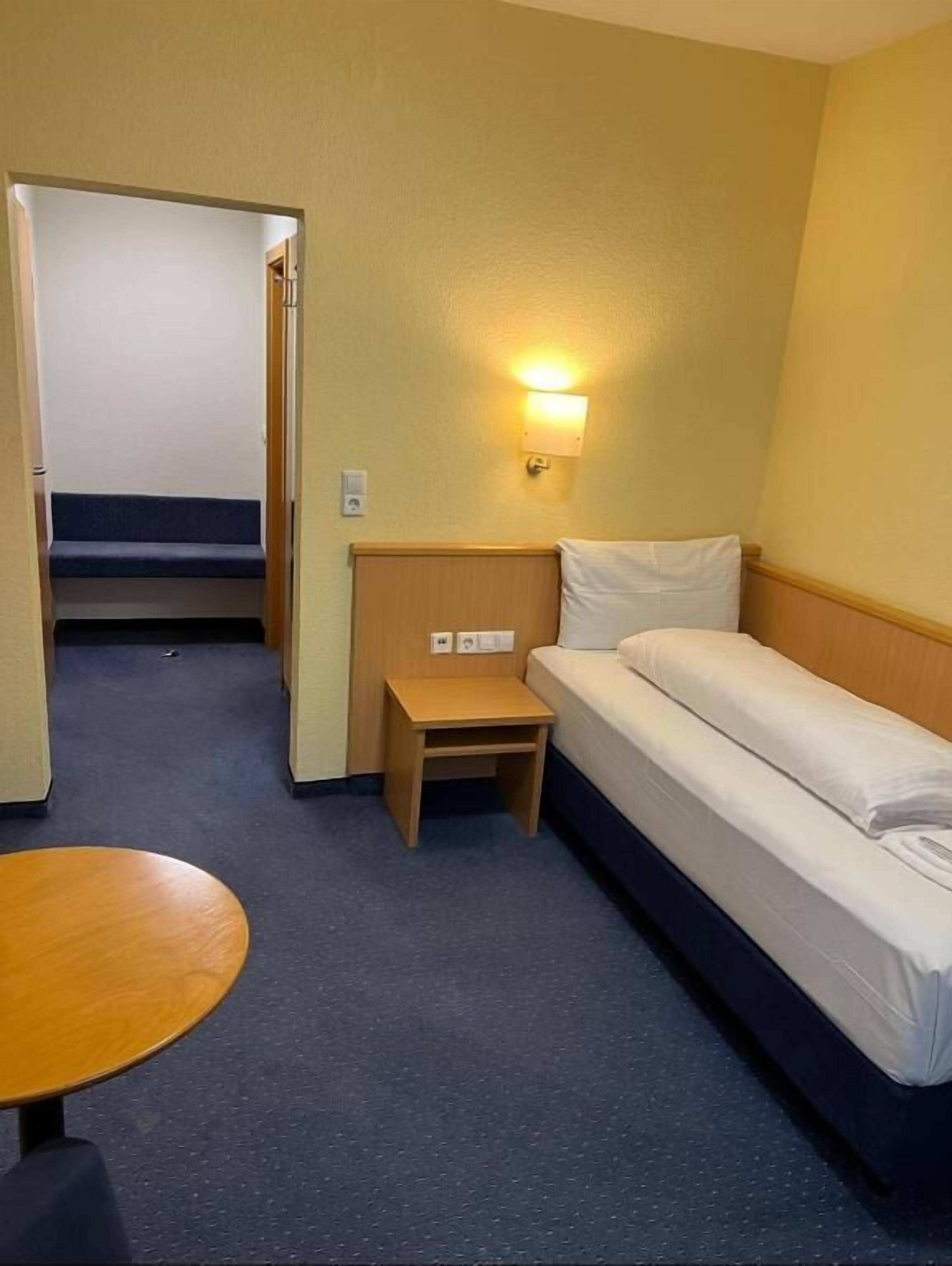 ห้องอีโคโนมีซิงเกิล | เครื่องนอนระดับพรีเมียม, โต๊ะทำงาน, Wi-Fi ฟรี, ผ้าปูที่นอน