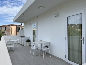 Habitación cuádruple (Sofi) | Tabla de planchar con plancha, cunas (de pago), wifi gratis