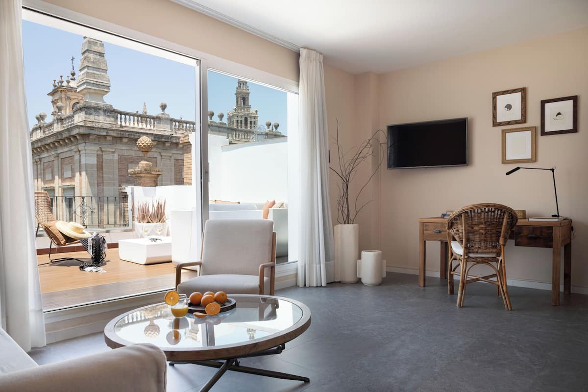 Design Penthouse, 1 Bedroom, Terrace, City View | Living area | Flat-screen TV