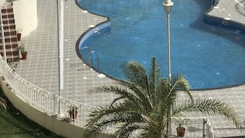 Outdoor pool, open 7:00 AM to 7:00 PM, free pool cabanas, pool umbrellas