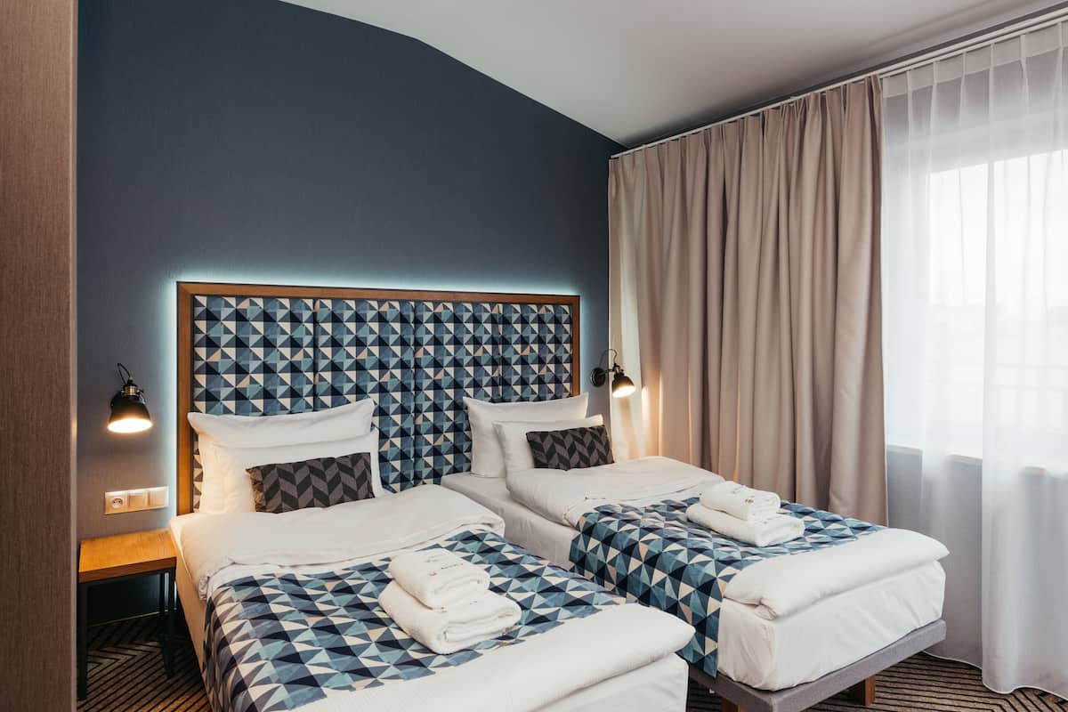 Premium bedding, desk, soundproofing, iron/ironing board