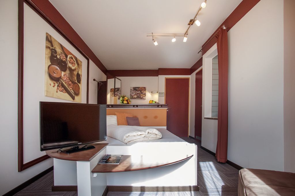 hypo-allergenic bedding, desk, blackout curtains, iron/ironing board