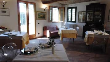 Breakfast, lunch, dinner served; local cuisine, garden views