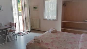 Cortinas blackout, Wi-Fi de cortesia, roupa de cama