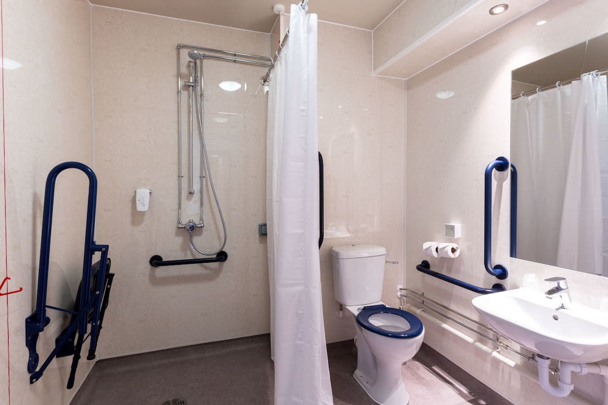 double or twin room, accessible | bathroom | shower, free toiletries, hair dryer, towels