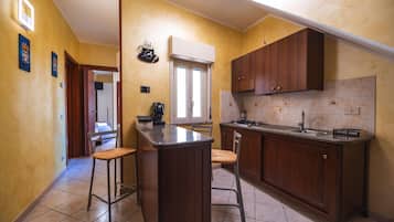Apartamento, banheiro privativo, vista para a cidade | Cozinha privada