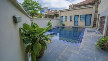 Outdoor pool, pool umbrellas, sun loungers