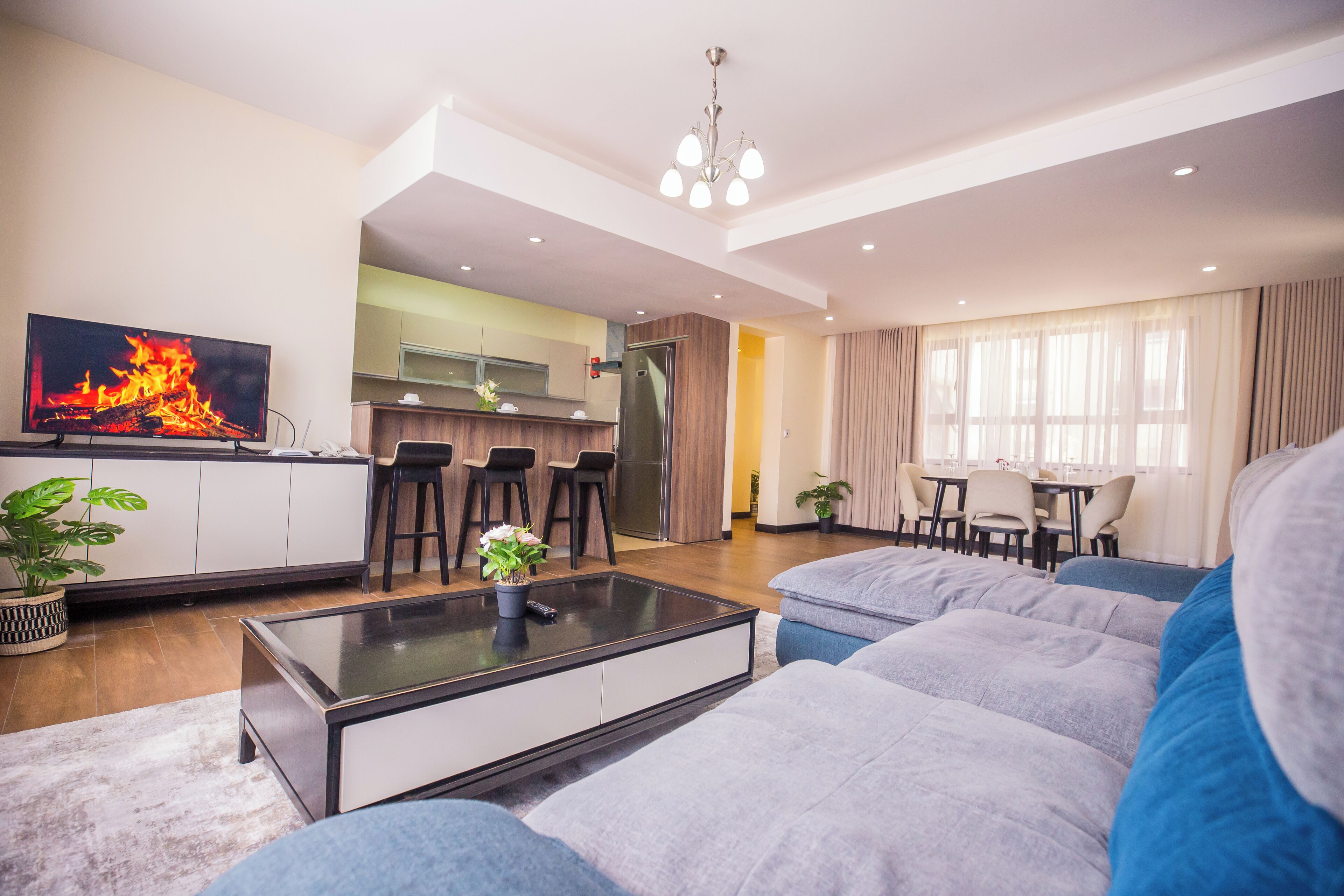 Apartamento família, 1 quarto | Área de estar | Smart TV