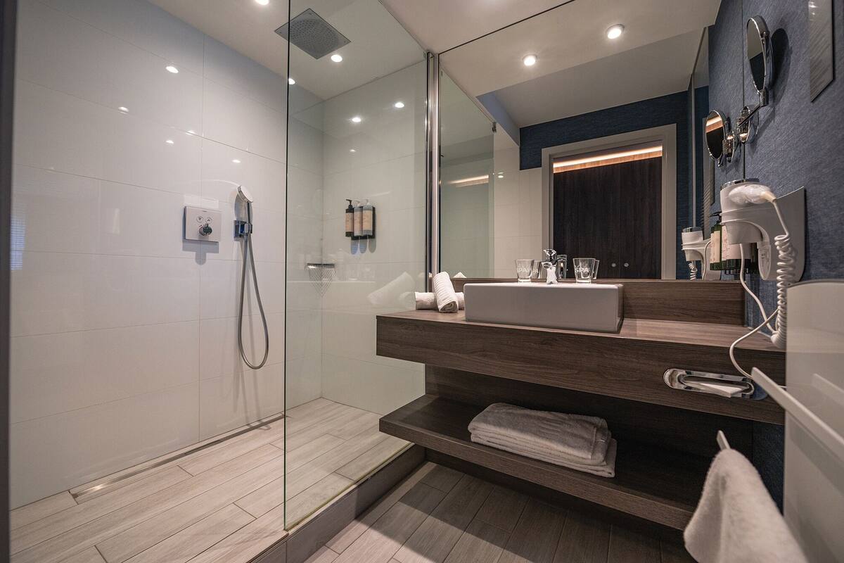 minibar, blackout curtains, soundproofing, free wifi