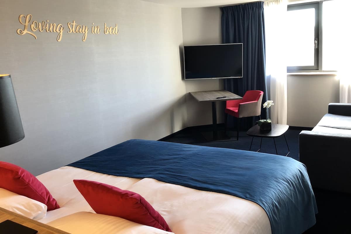 Een minibar, verduisterende gordijnen, geluiddichte muren, gratis wifi