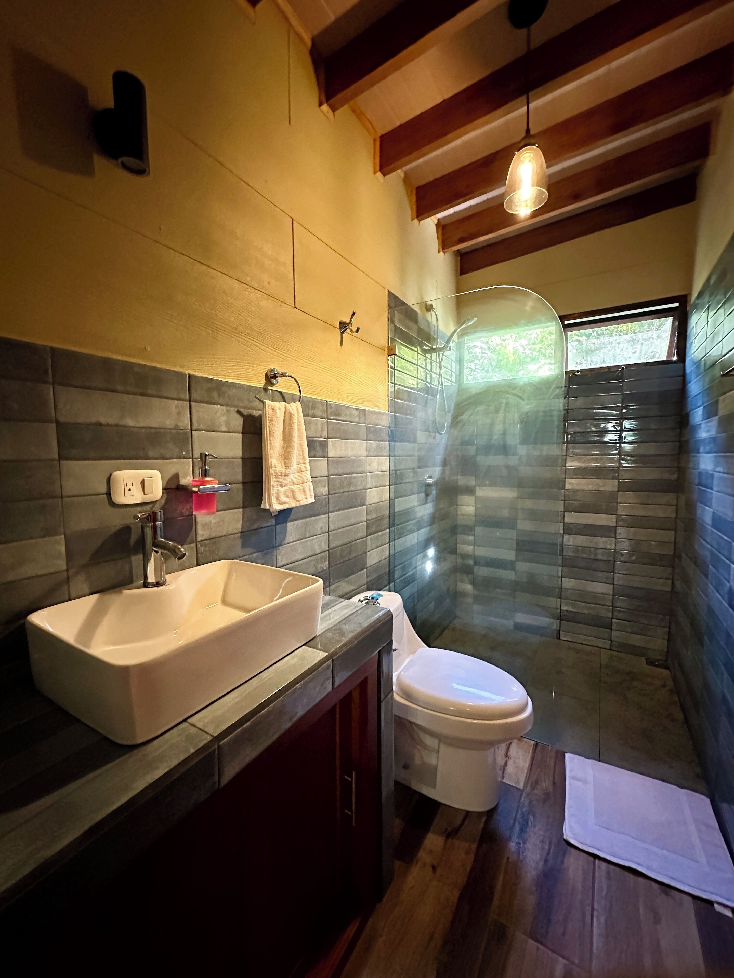 superior studio, mountain view, mountainside | bathroom | shower, towels, soap, shampoo