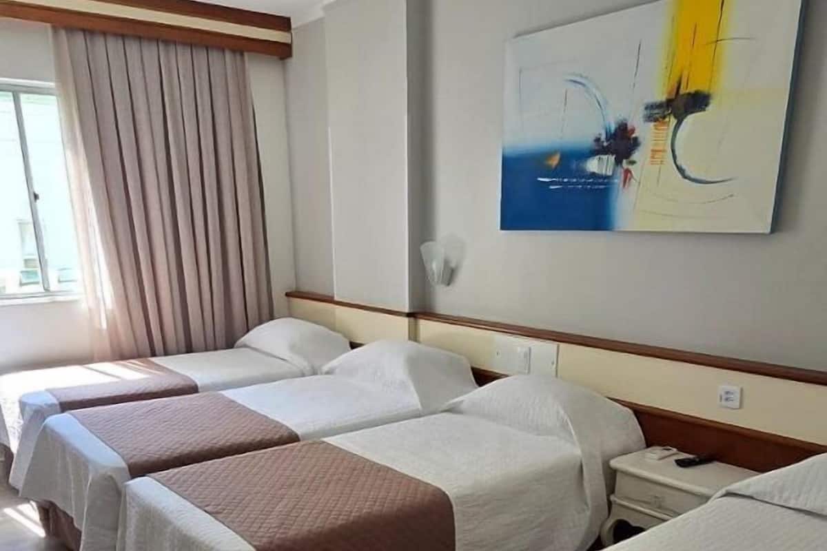 Standard Quadruple Room, Multiple Beds | Minibar, in-room safe, desk, blackout drapes