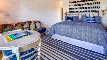 Standard Room, 1 King Bed, Lake View | 1 bedroom, free minibar items, in-room safe, individually decorated