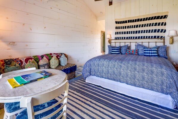 Standard Room, 1 King Bed, Lake View | Free minibar items, in-room safe, individually decorated