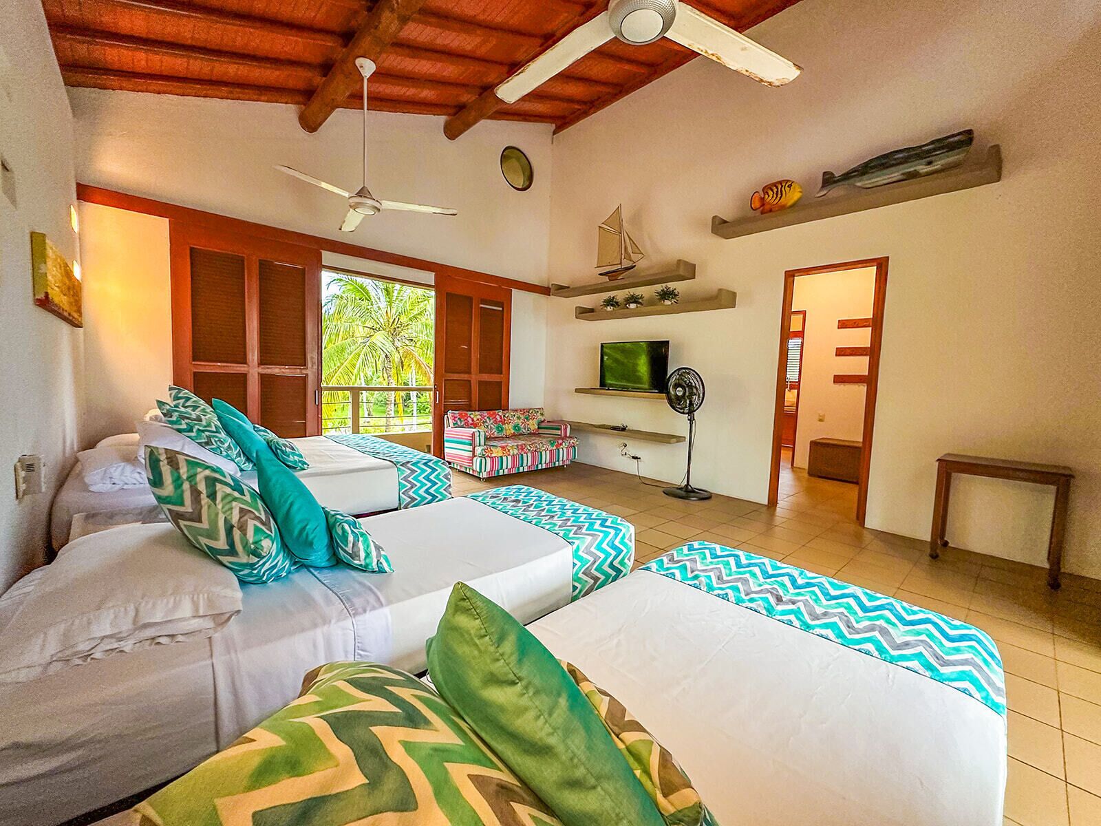 deluxe quadruple room | 1 bedroom, premium bedding, in-room safe, individually decorated