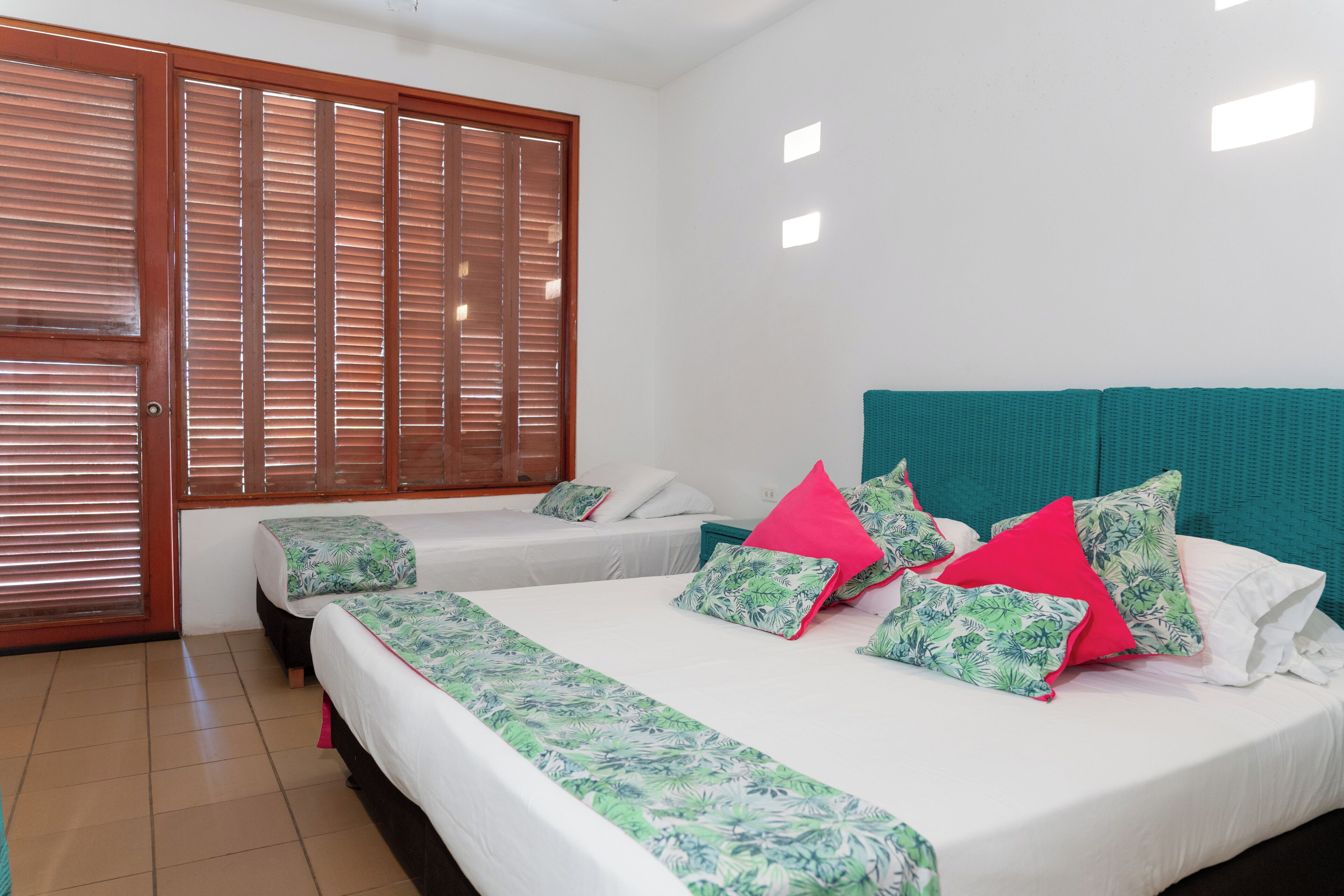 Deluxe Triple Room | 1 bedroom, premium bedding, in-room safe, individually decorated