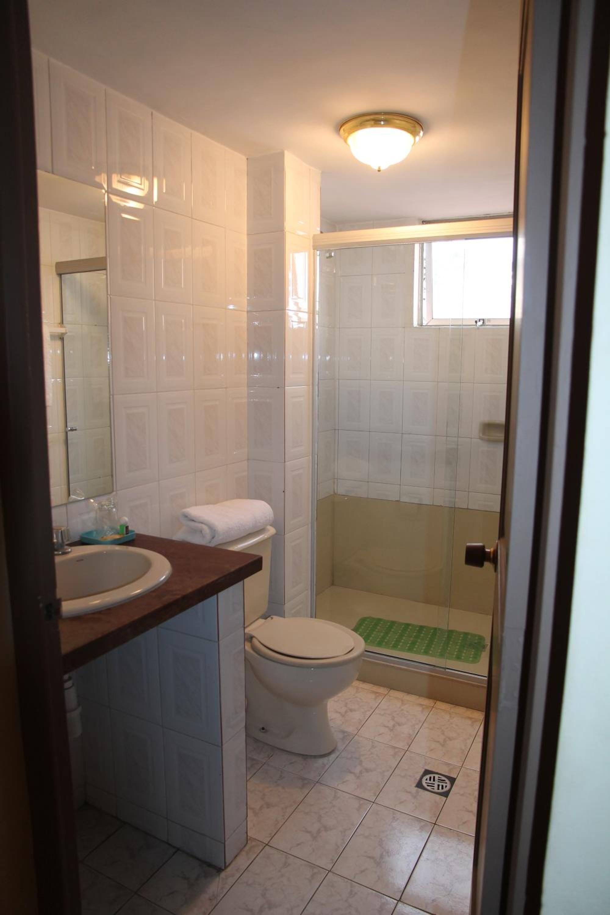 combined shower/bathtub, deep-soaking bathtub, rainfall showerhead