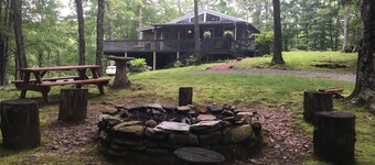 5 acres 4 bedroom cabin close to everything with fire pit, swimming fishing lake