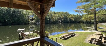 5 acres 4 bedroom cabin close to everything with fire pit, swimming fishing lake