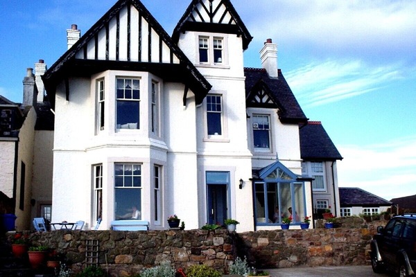 Dalmore with wonderful views over the beach, harbour and the bay beyond