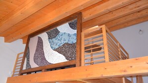 A wooden balcony with a mosaic wall and a wooden staircase. - GRECALE Studio 2/3 sleeps with Pool - Modica - Sicily (Modica)