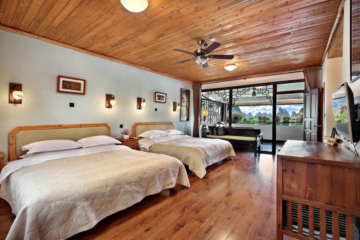 superior double room, 2 queen beds, balcony, river view | pillow-top beds, minibar, in-room safe, individually decorated