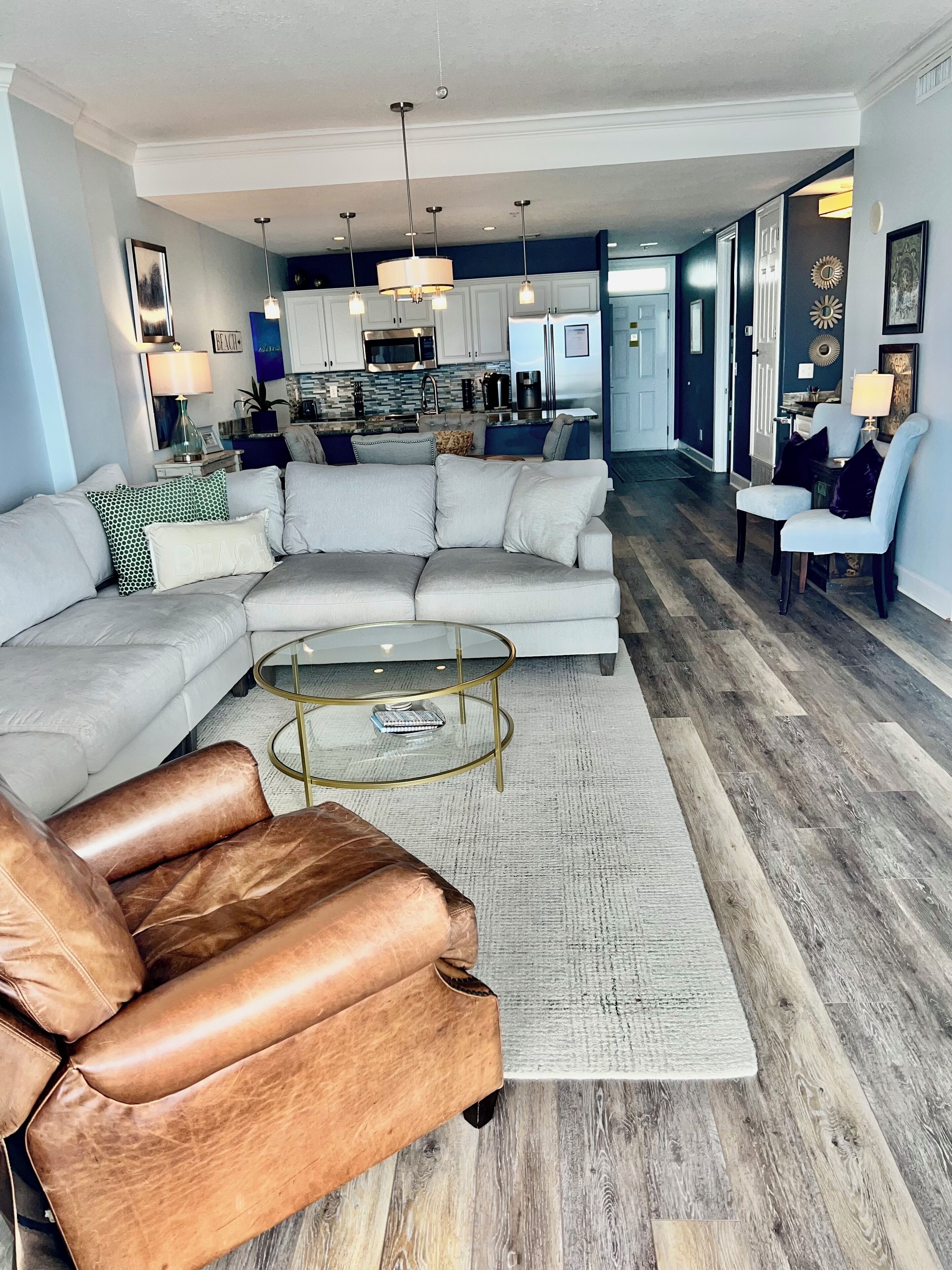 Flat-screen TV, DVD player, books, video library