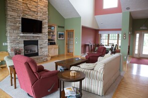 Smart TV, fireplace, DVD player, books