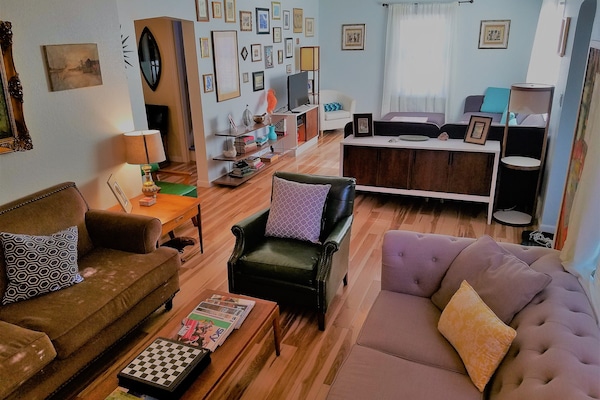 Two sitting areas-tv room and fireplace room