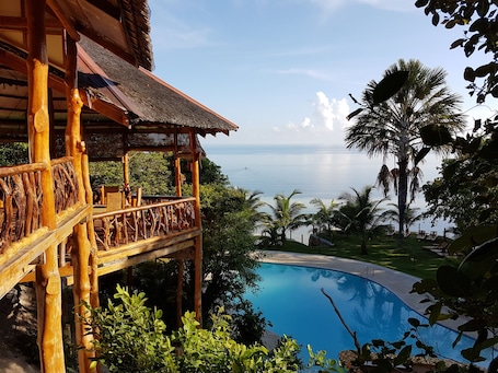 Breakfast, lunch served; local and international cuisine, pool views