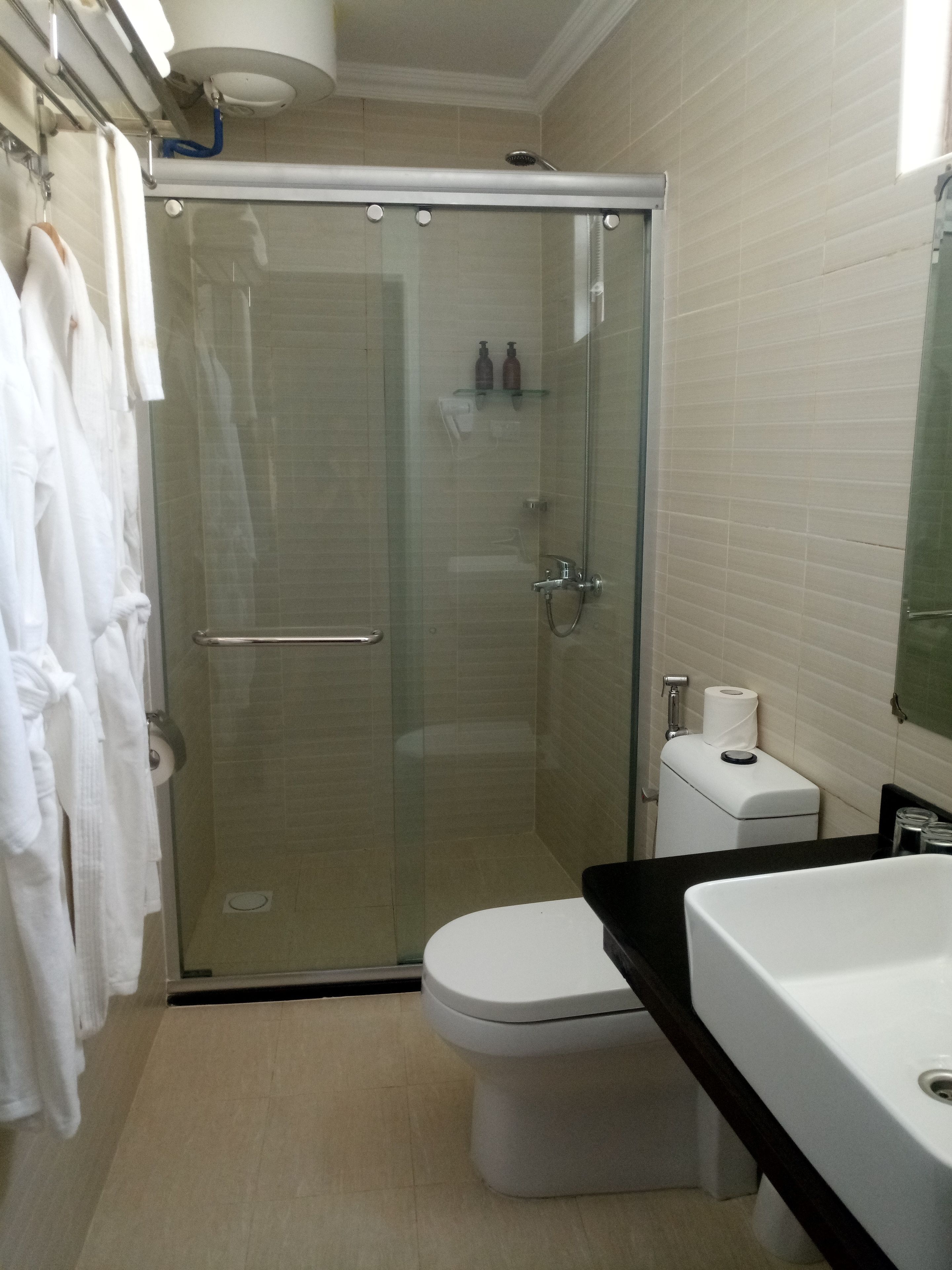 superior studio suite, kitchenette | bathroom | shower, free toiletries, hair dryer, bathrobes