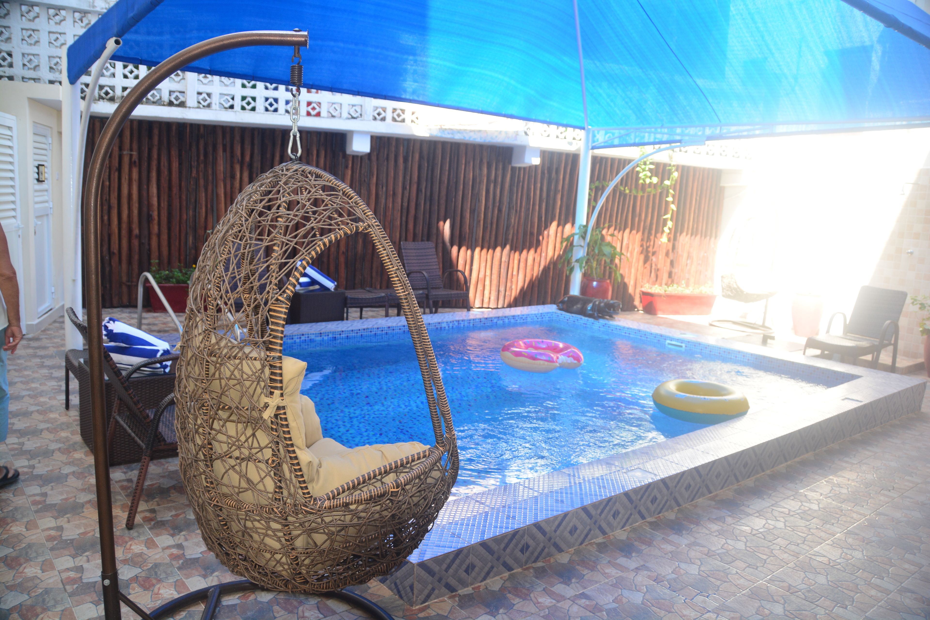 outdoor pool, pool loungers