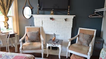 Family Suite, Fireplace, River View | Blackout drapes, soundproofing, iron/ironing board, free WiFi