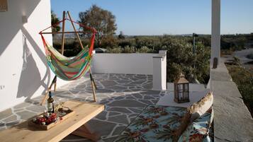 Suite Luxe, 1 trÚs grand lit, véranda, vue montagne | Literie de qualité supérieure, surmatelas, décoration personnalisée