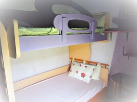 A bunk bed with a lower bunk and a top bunk.