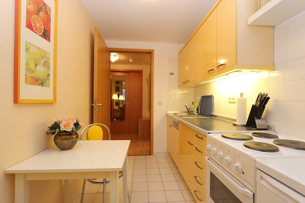 Fridge, oven, dishwasher, high chair